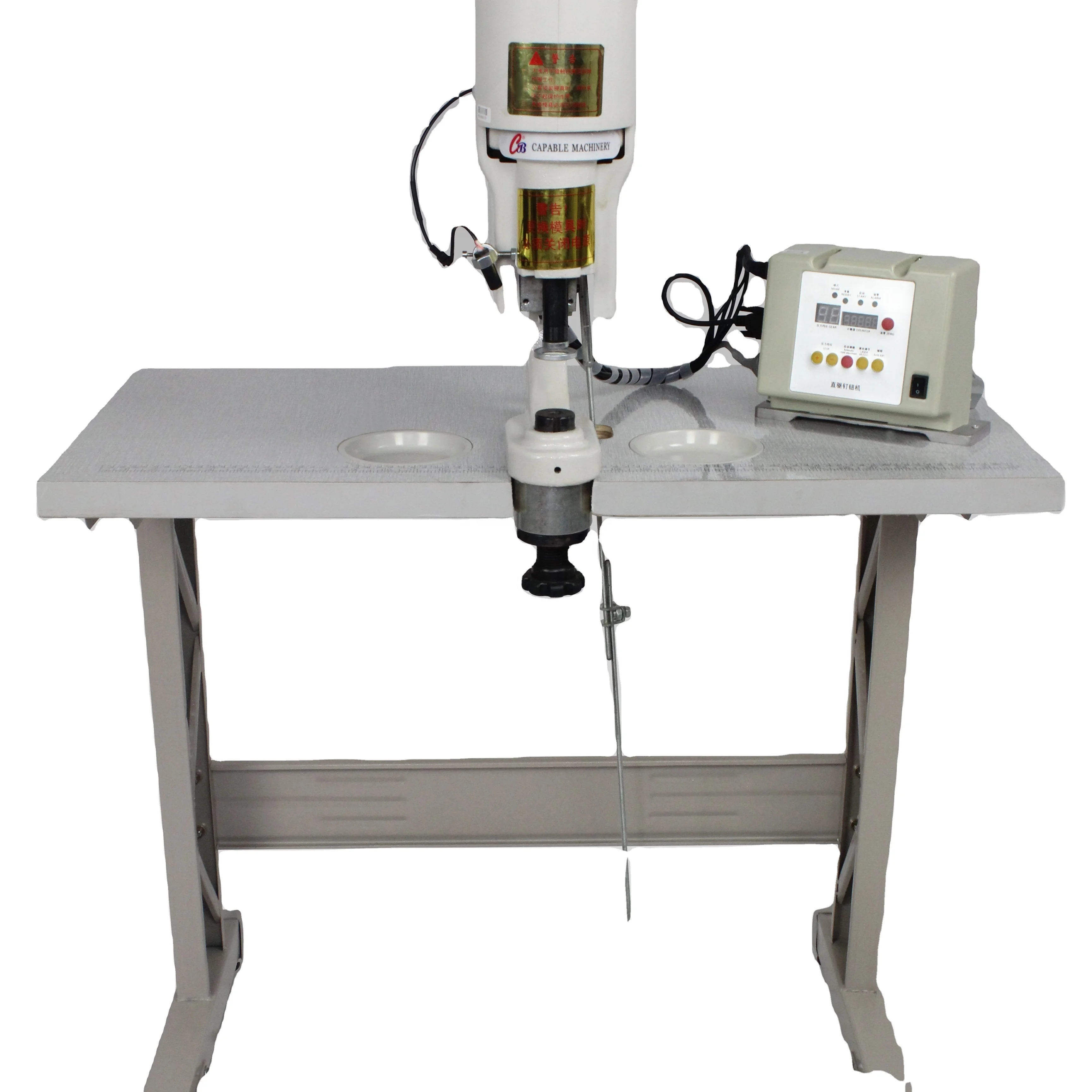 Semi-automatic button cover and fixing machine