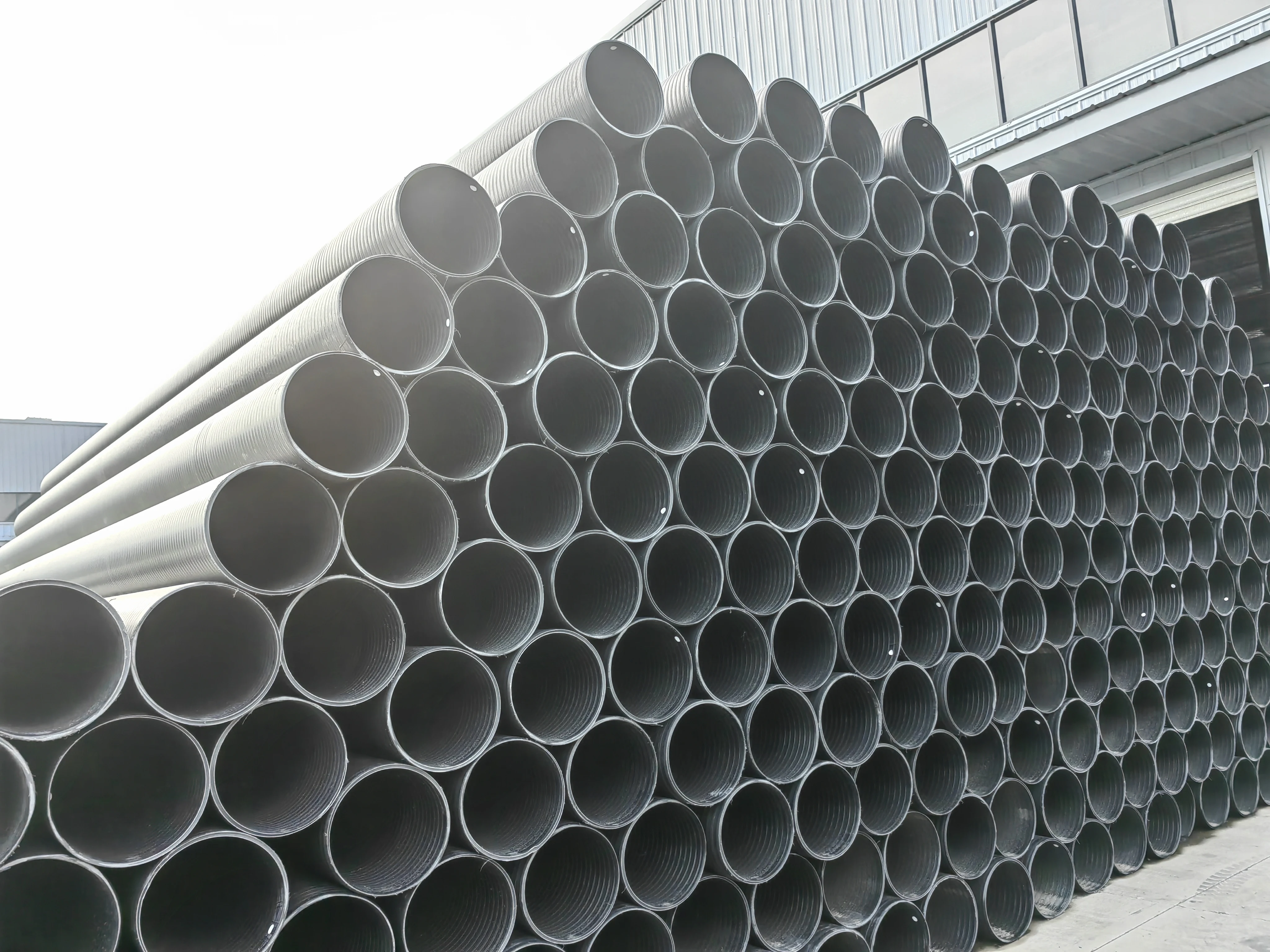 HDPE двойная плоская стенка полая обмоточная труба пластиковая черная Усиленная стальная полоса большого диаметра
