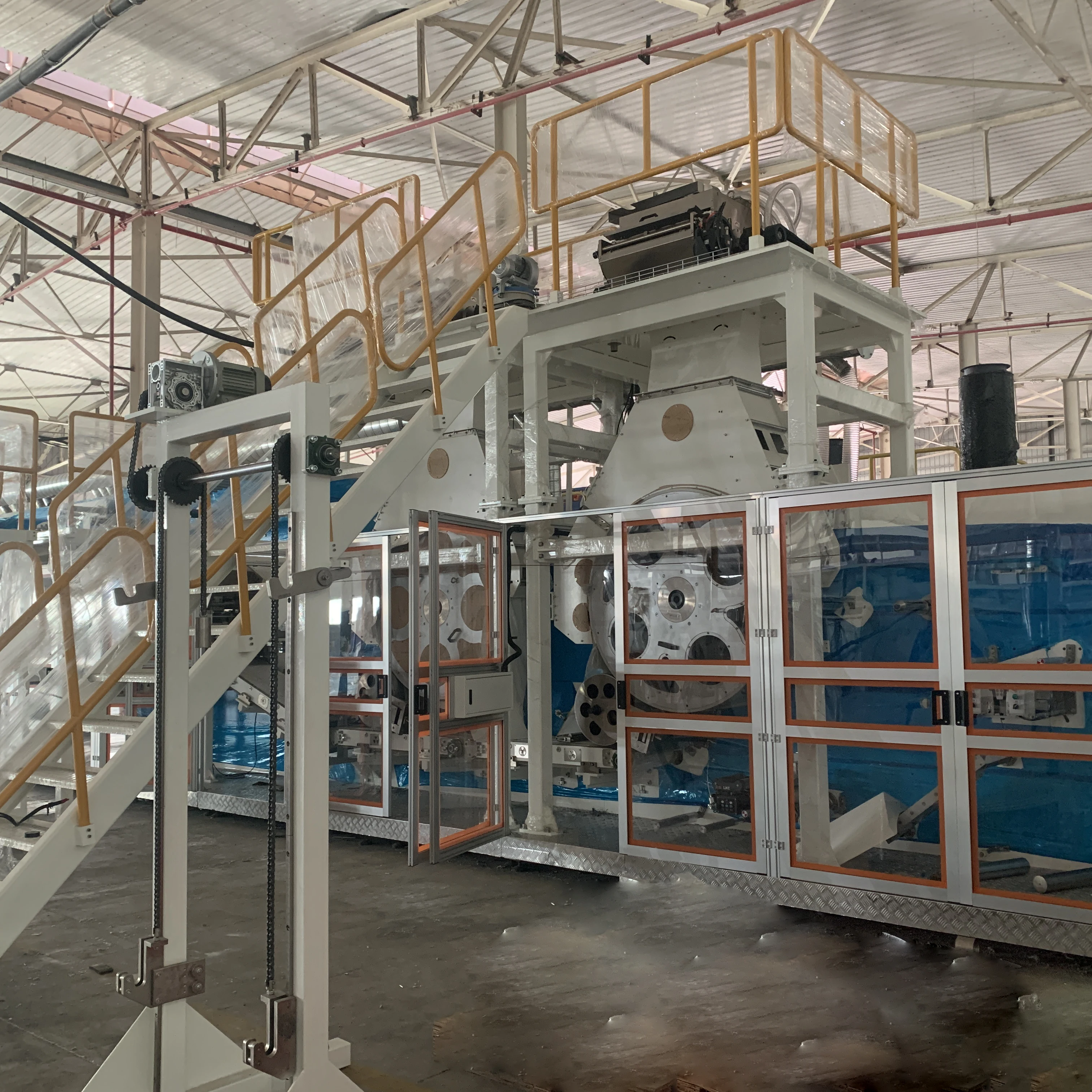 Hot Sell Low Price Full Automatic Servo Motor Driving Disposable Fluff Pulp Adult Patient Diapers Production Line