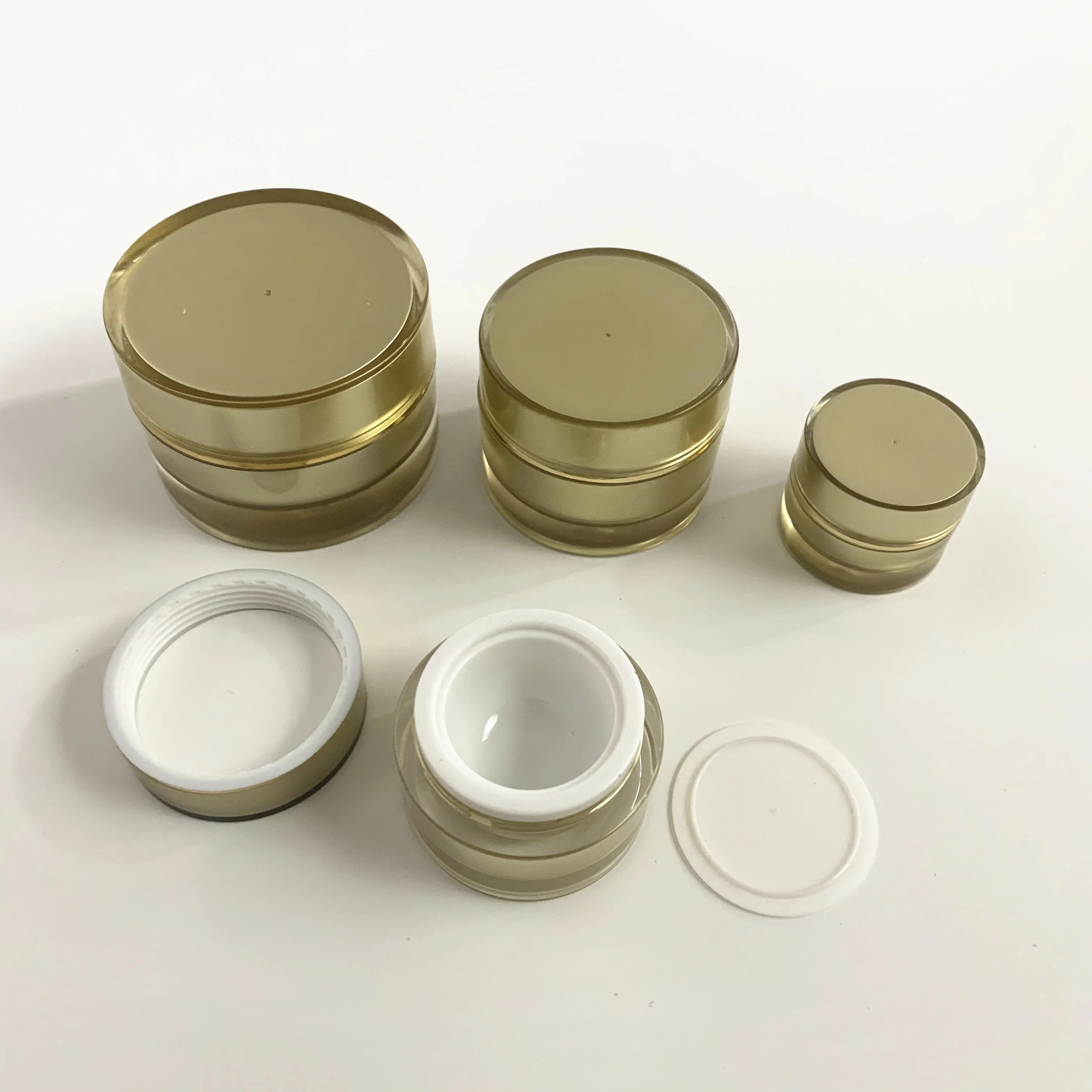 Stock 3g 5g 10g 15g 30g plastic jars with golden lids Cosmetic Cream Jar Custom Private Label Lip Scrub Containers