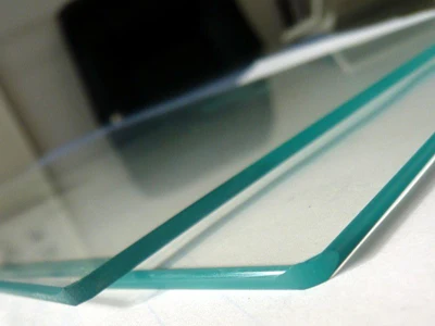 
clear glass with big size or cut to size polished edges and washed 