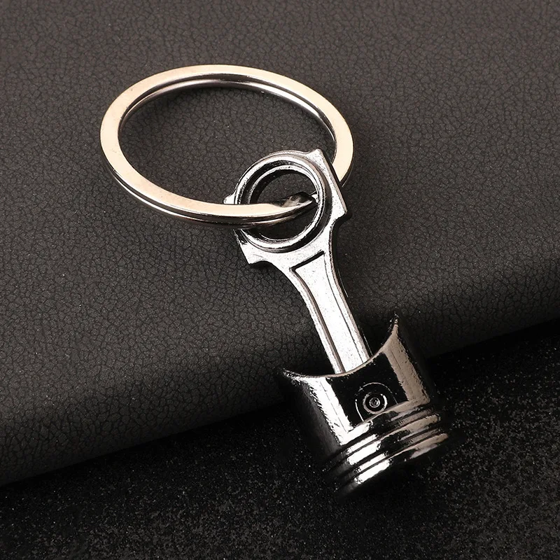 Wholesale 3D Alloy Piston Engine Keychain Customizable Logo Metal Car Piston Carabiner Promotional Keychains