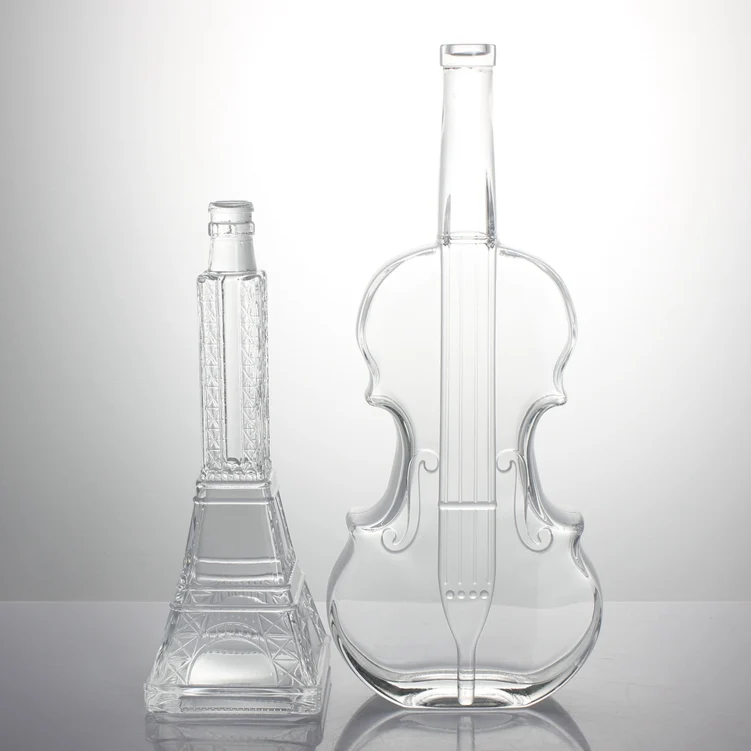Customized Eiffel Tower Embossed 500ml 750ml Round Extra Flint Spirits Whisky Vodka Brandy Bottle with Cork Glass Clear 750 Ml