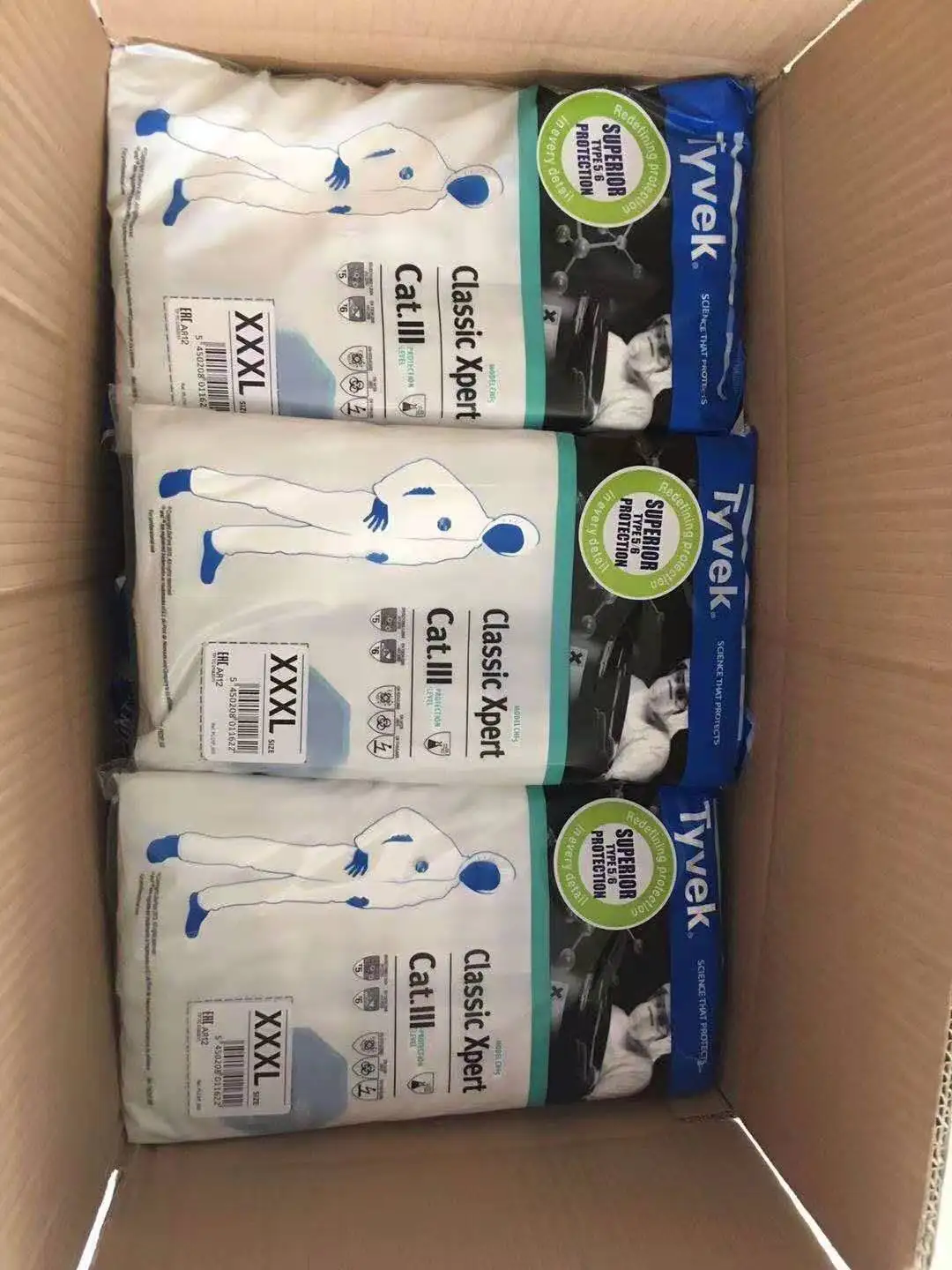 Cheap dupont fabric wholesale disposable hazmat suit sms ppe set disposable coveralls AAMI ppe gowns