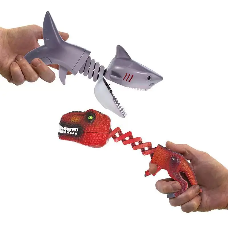 Hot Selling Kids Dinosaur shark toy Funny Dinosaur Shark Telescopic Arm Claw Extendable toy hand grabber kids toys gun