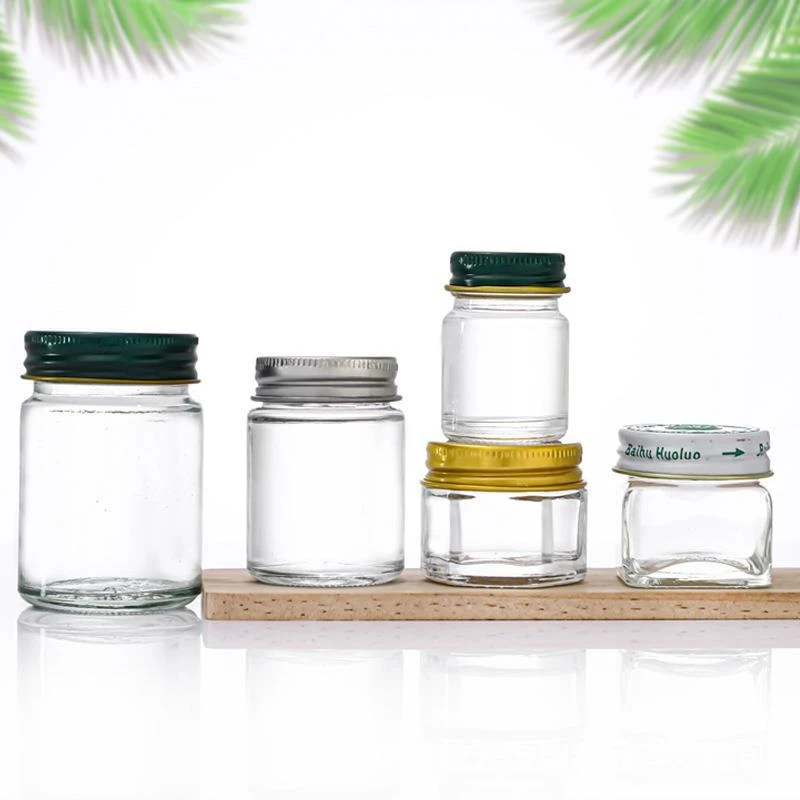 Made in China Thai Grass Cream jar food grade 1.5 oz 50ml small glass storage jar container with metal screw green cap