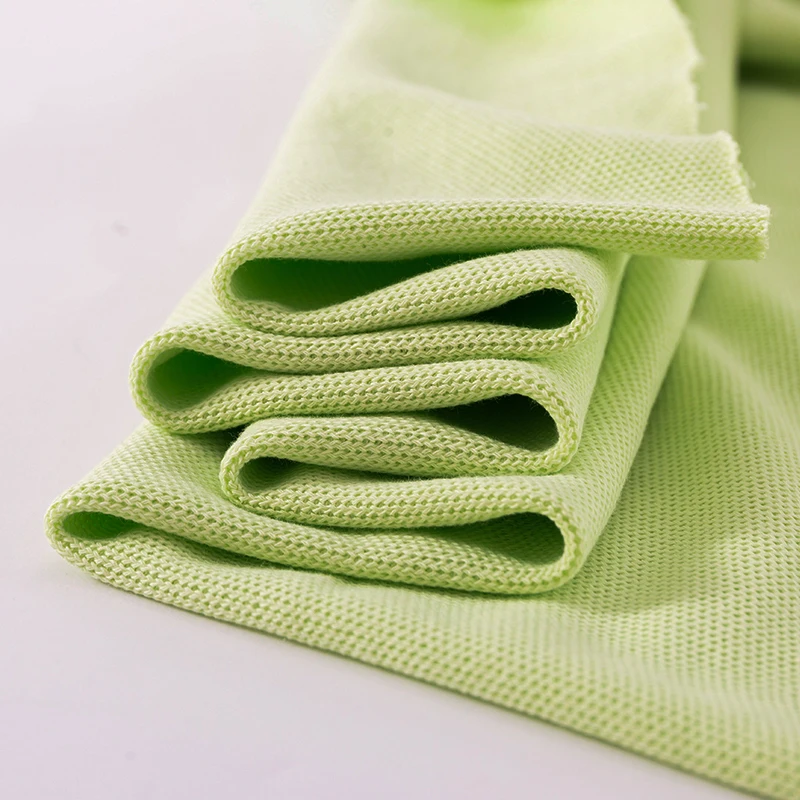 Best Selling Polo Shirt Fabric 290 GSM 55% Cotton 45% Polyester CVC Knitted Fishnet Pique Fabric for Polo T-shirt