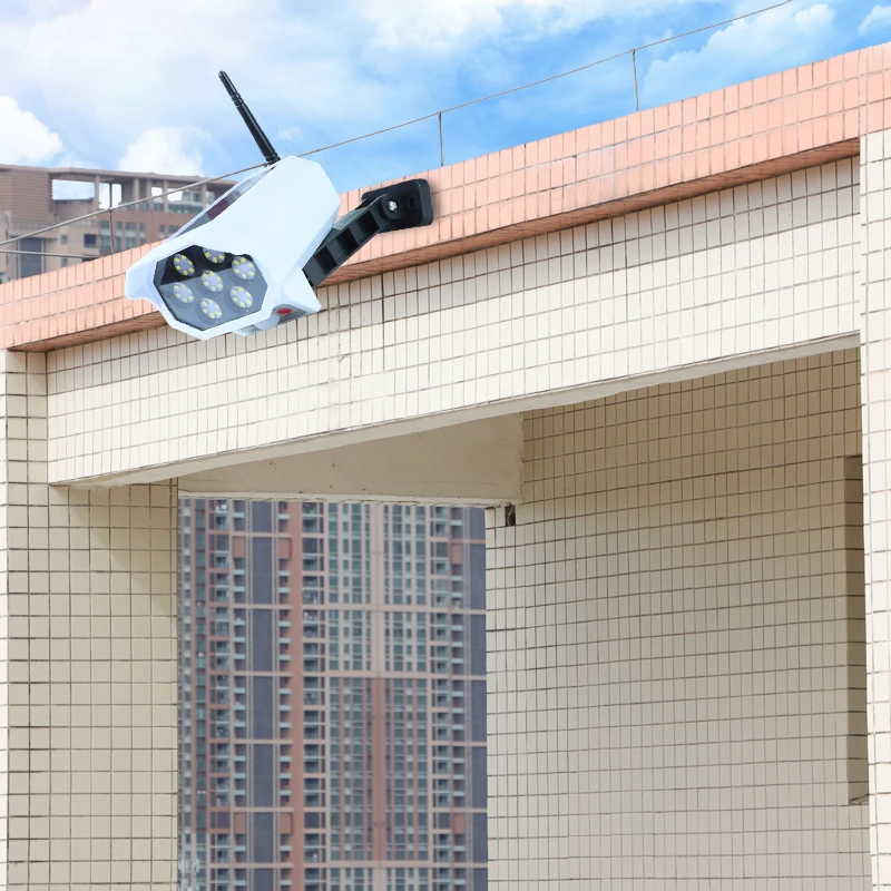 China wholesaler 2021 newest products Garden Waterproof Solar Panel Powered Simulation Security CCTV CameraWith Leds