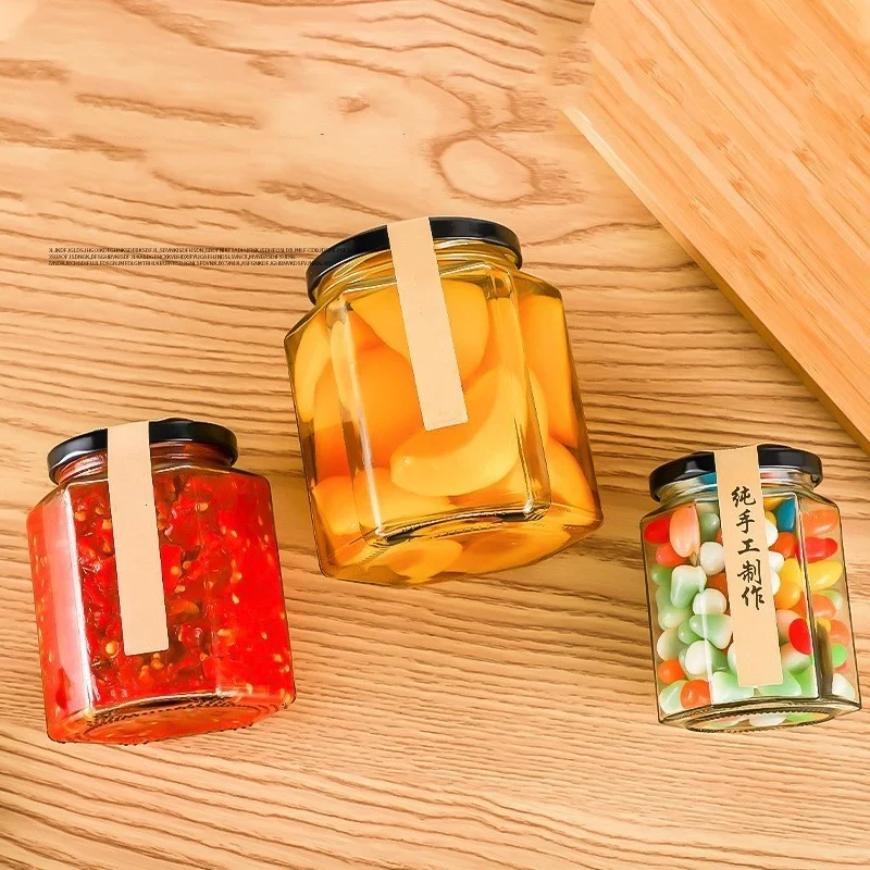 Высококачественные шестигранные утолщенные прозрачные кухонные контейнеры для хранения пищевых продуктов стеклянная банка меда с герметичной металлической крышкой