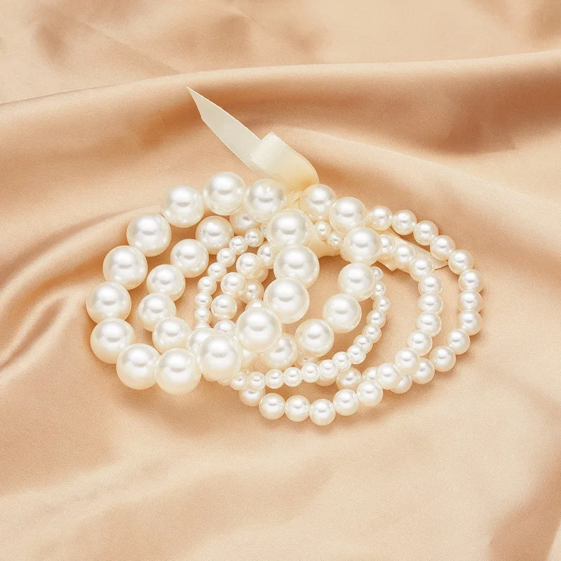 Wholesale Fashion 5pcs/set Ivory girls women ABS Elastic Imitation Pearl Bead Bracelet Cute Pearl bow Bracelet Set