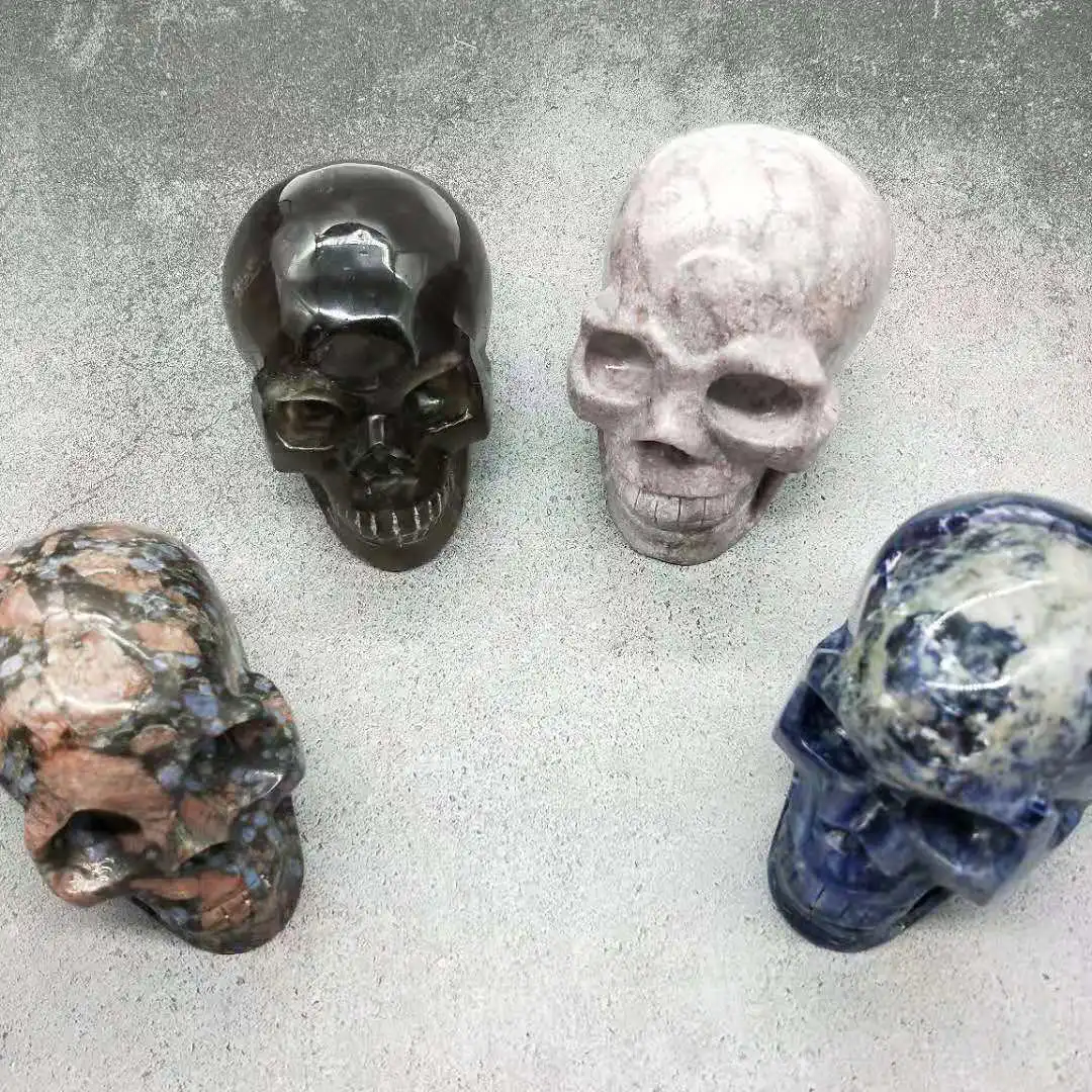 wholesale crystal skulls top quality hand carving human llanite skulls crystal crafts for fengshui decoration