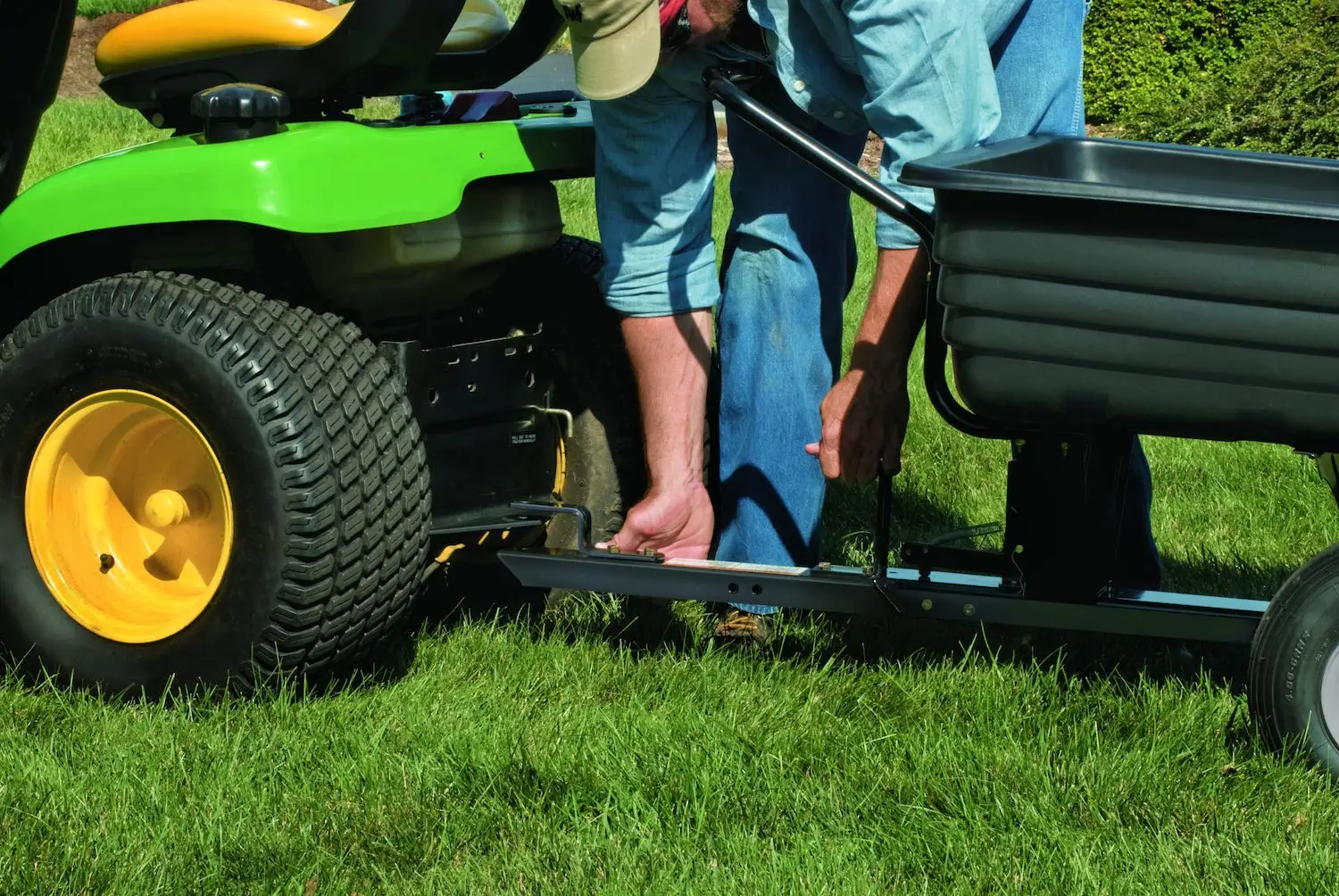 BLACK AGRICULTURE TOW and PUSH POLY CART ON FARM  trailer cart