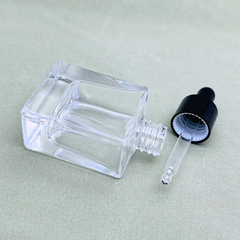 High-end Square Clear Glass Dropper Bottle 25ml Rectangle Glass Dropper Bottle For Cosmetic Essential Oil