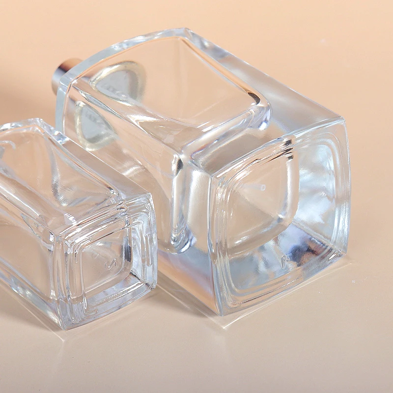 Luxury 100ml Transparent Glass Perfume Bottle Customized Empty with Matte Finish Lids Spray for Cosmetics Fragrance Creation