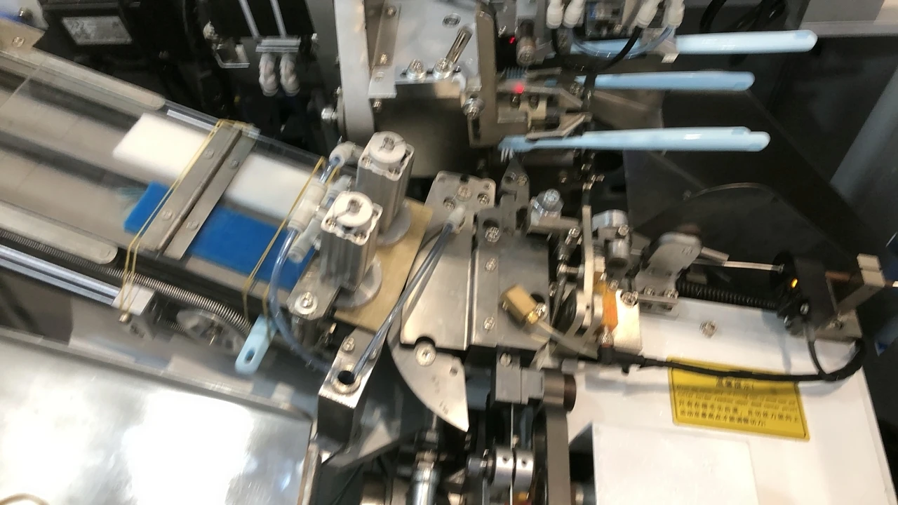 High speed auto loading toothbrush making machine