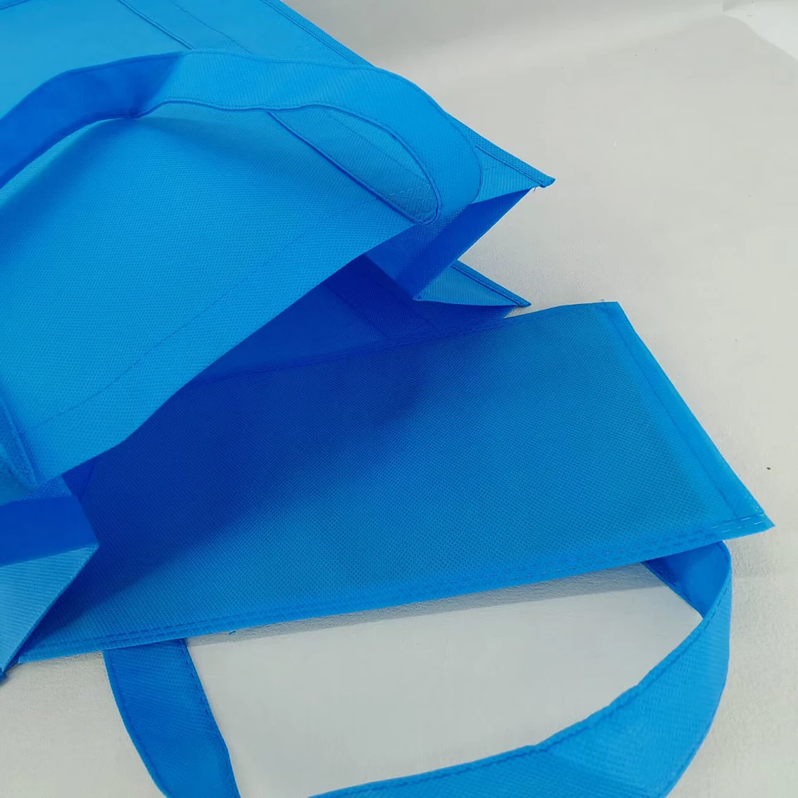 Custom large durable custom logo printed pp non woven fabric store grocery shopping bag with strong long handle