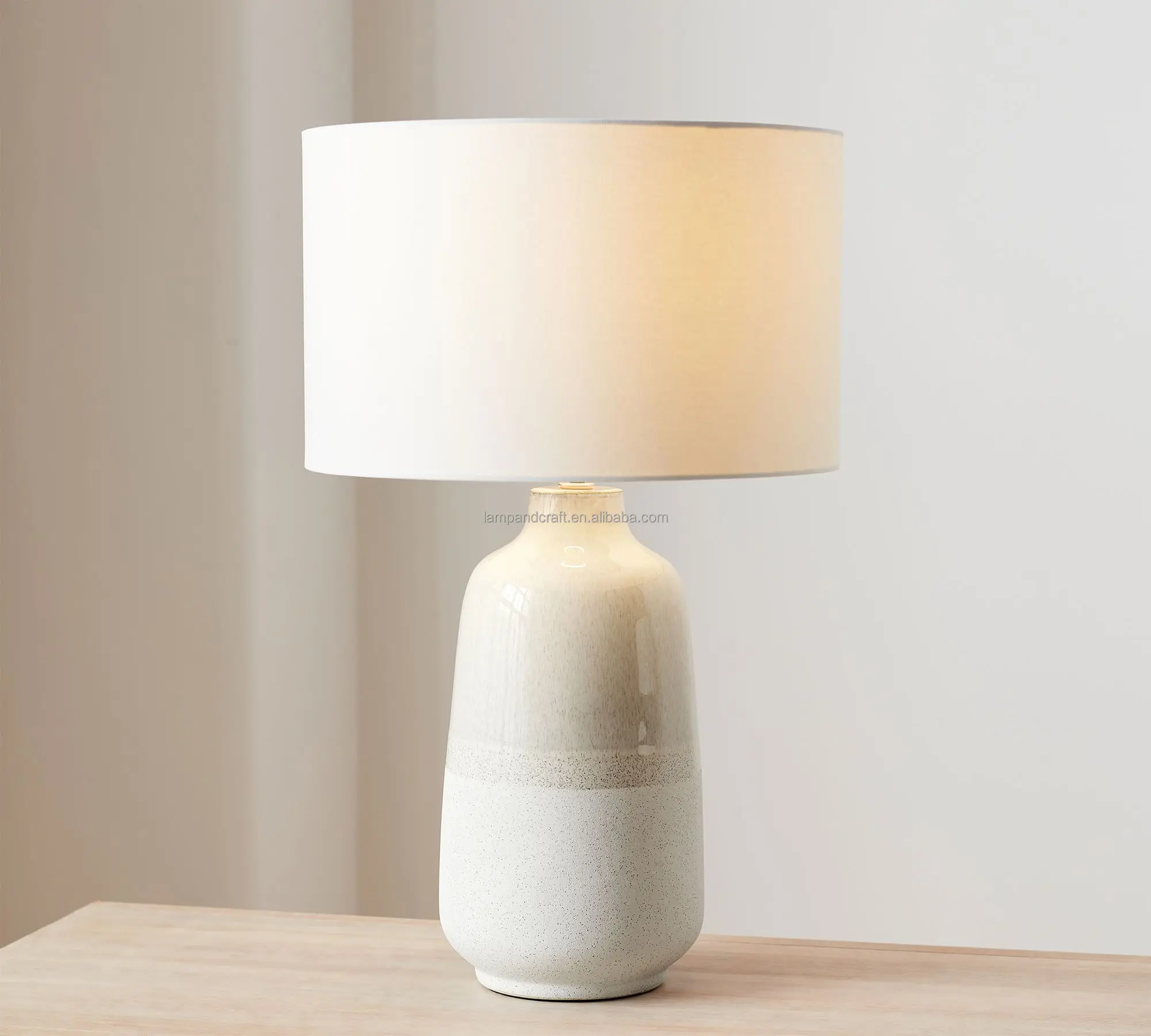 ceramic base table lamp Includes a cream linen drum shade