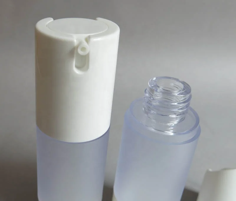 Wholesale 15ml 30ml 50ml empty travel mini vacuum clear frost round airless lotion cream plastic bottle for skin care