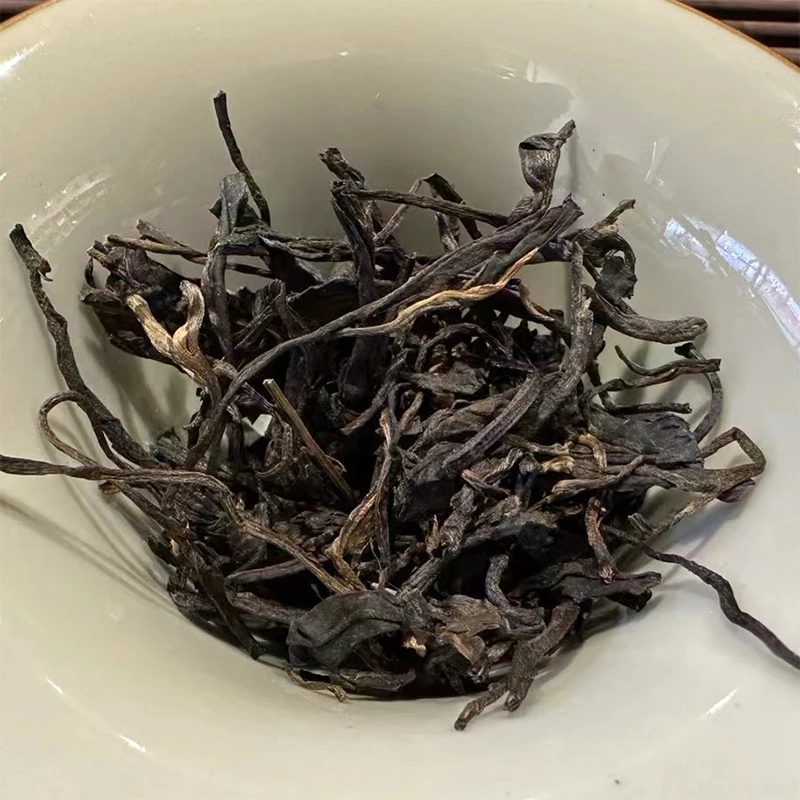 KAIYANGE Wholesale 100% Natural Organic 2010 Old Raw Puer Tea Cake YiWu GuaFengZhai Pu Er Tea in 357 Grams Elite Tea