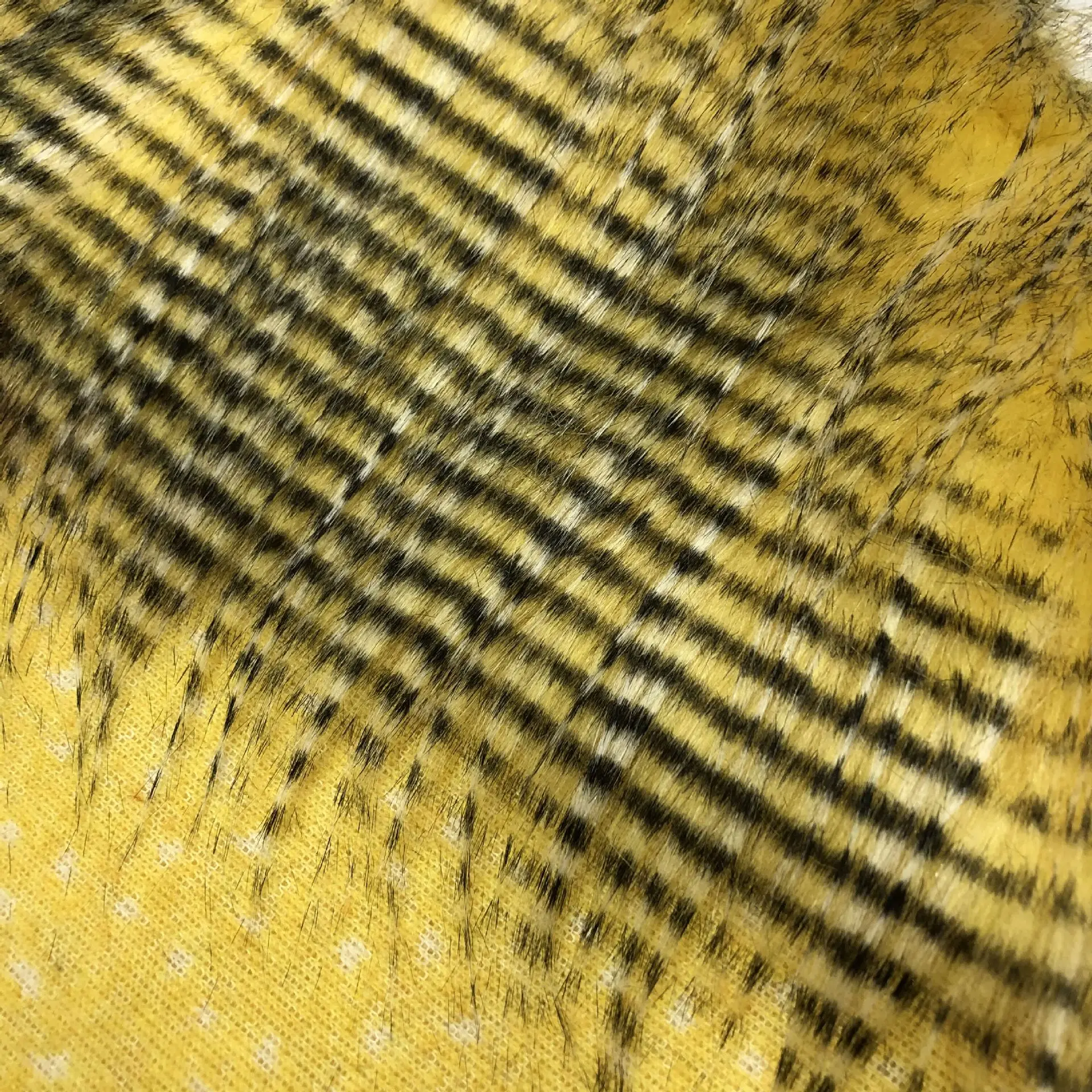 Hot sale 100% synthetic material animal print long faux feathered  fur fabric imitation fur plush fabric