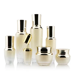 Cosmetic packaging luxury gold cosmetic containers set 50g glass cream jar 100ml 120ml bottle jars
