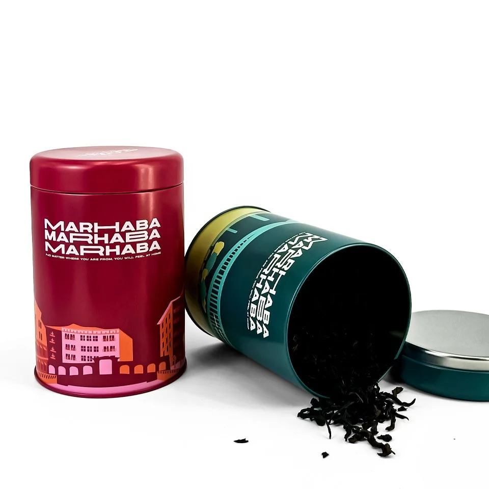 Wholesale embossing food grade empty luxury decorated tea tin coffee tea tin box packaging airtight black round loose tea tin