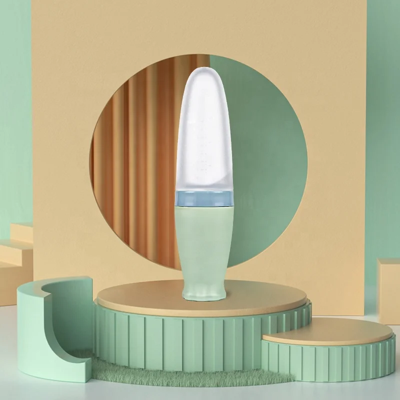 Silicone New Babi Product Baby Squeeze Rice Paste Fruit Feeding Bottle With Spoon Feeder For Kids