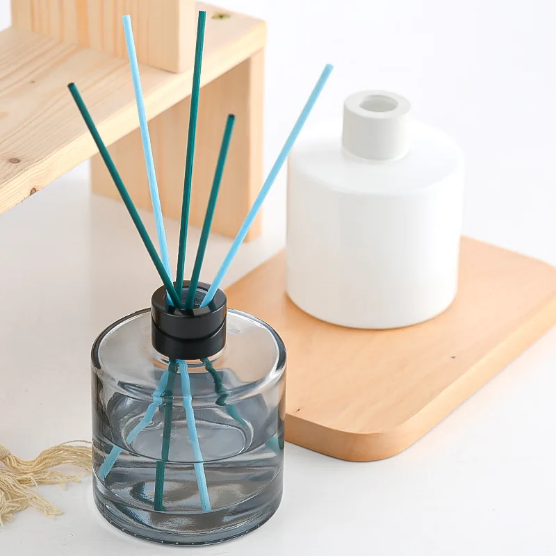 Professional manufacturer luxury essential oil fragrance reed round reed glass diffuser bottle with lid
