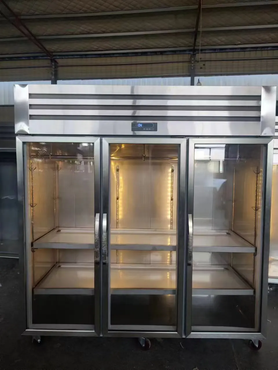 Custom supermarket grocers use commercial fresh meat lambs for hanging displays of meat case