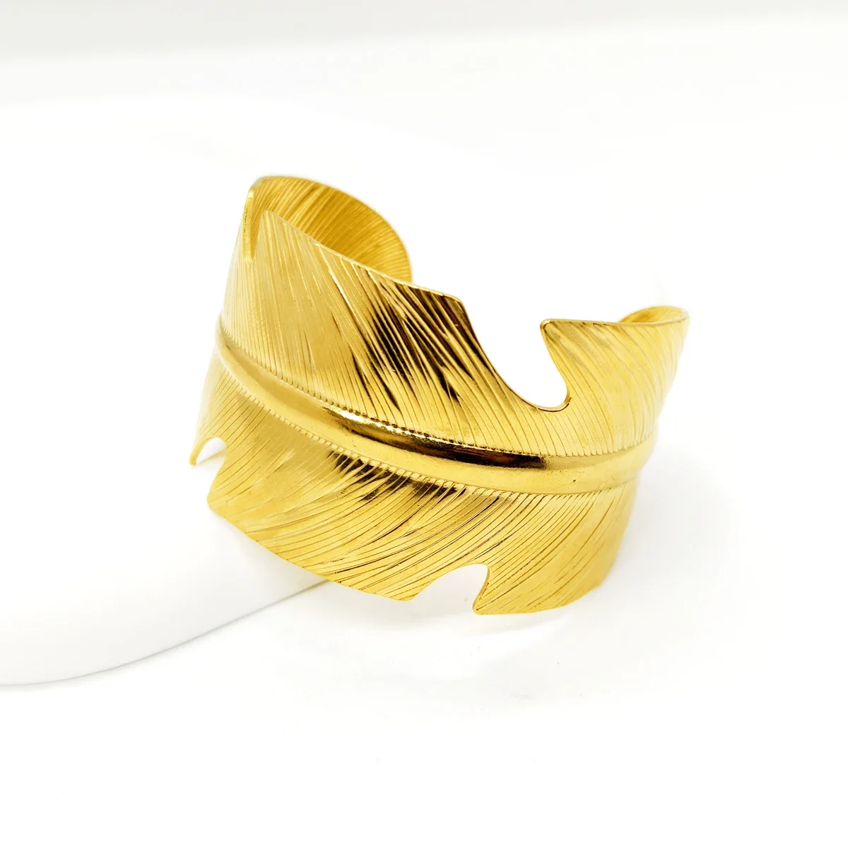 12pcs Interesting fashion design exaggerated large feather shaped stainless steel bracelet for women as a gift