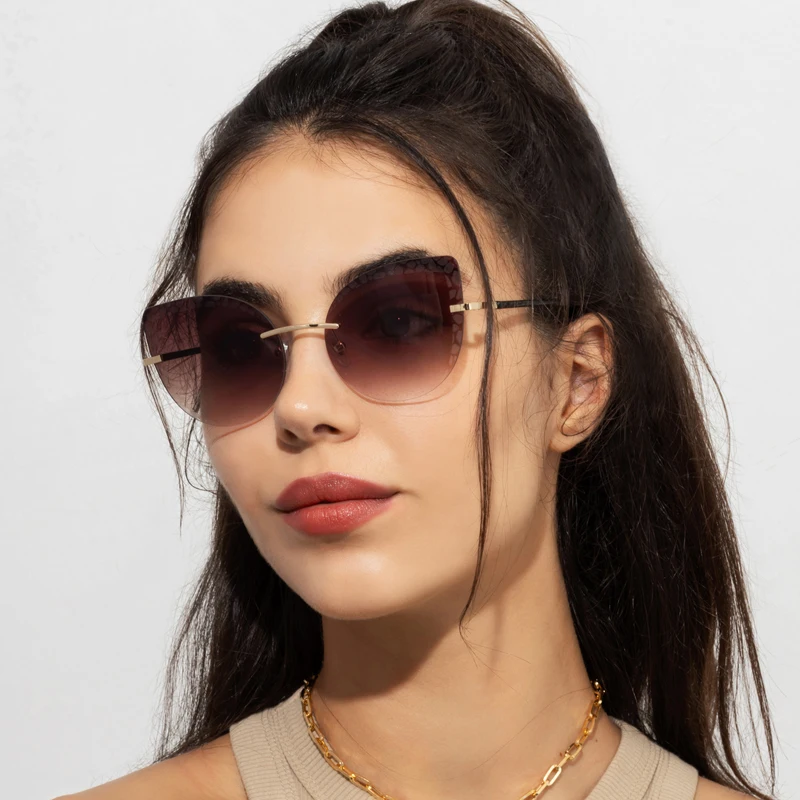 2022 New Fashion Large Frame Cat Eye Rimless Cut Edge Metal Glasses Gradient Sunglasses