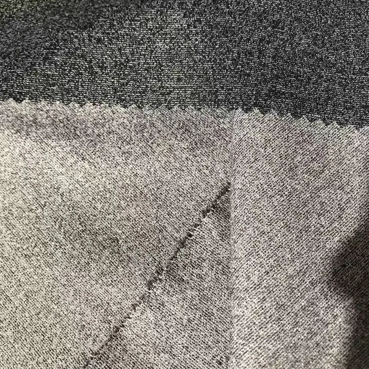 Cationic melange single jersey knit 4 way polyester elastane fabric for sportswear