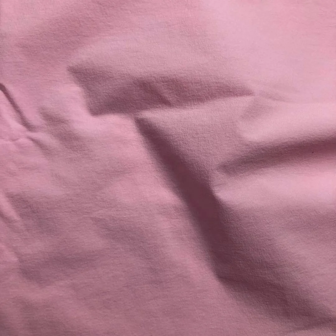 
2021 high quality 40D four way stretch Nylon teffeta plain fabric SPF 50+ micro wrinkle fabric for sports pants sunscreen 