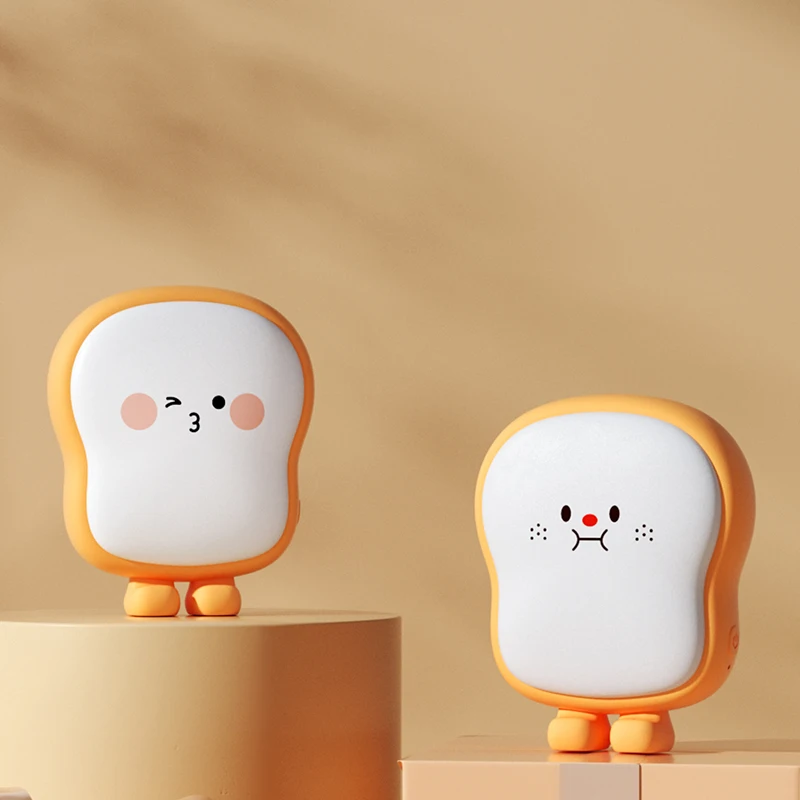 2022 newest creative portable cute toast hand warmer power bank 6000mah usb rechargeable winter electricnic product hand warmers