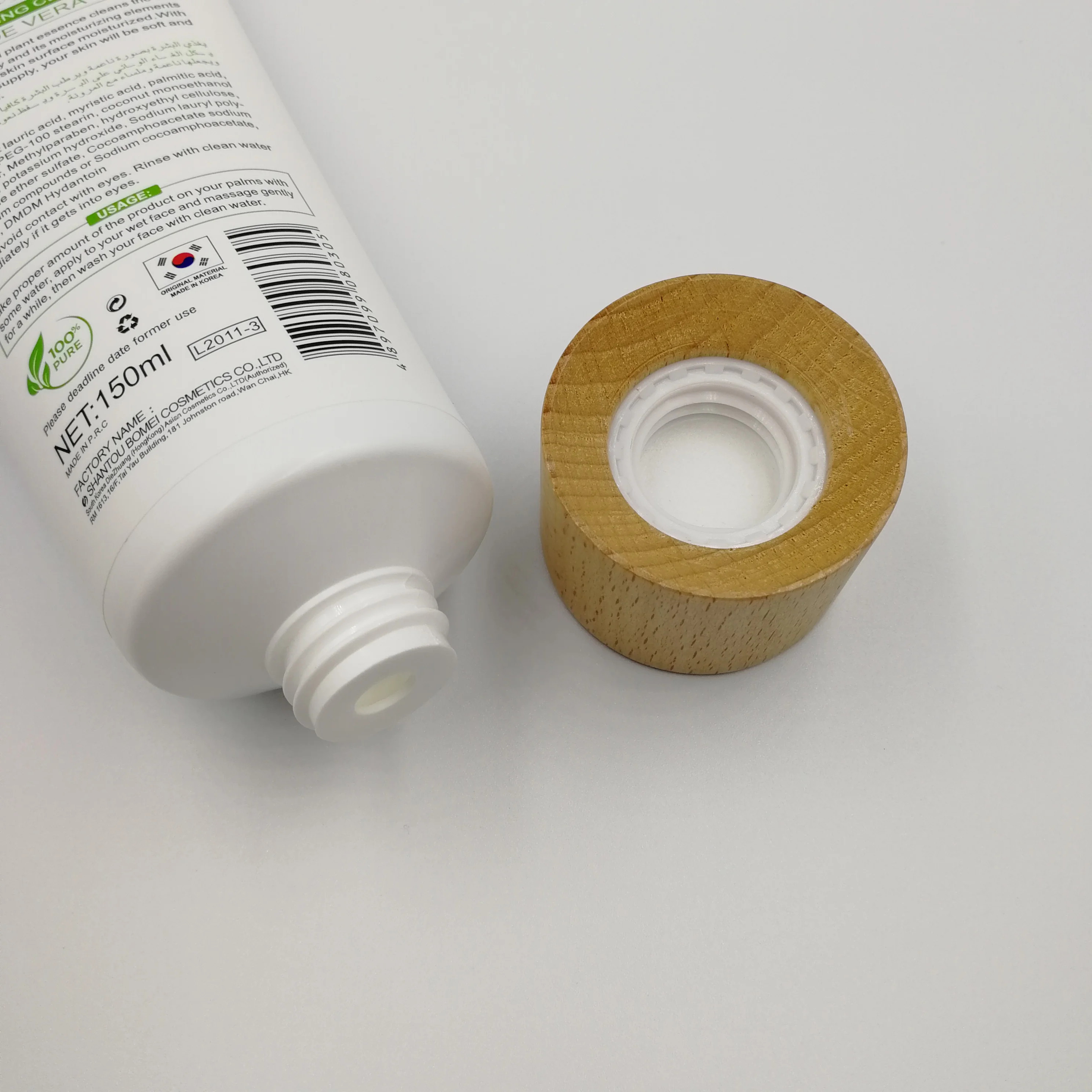 
40g-150g high quality cosmetic packaging soft tube PE squeeze tube wooden screw cap for skin care facial cleanser 