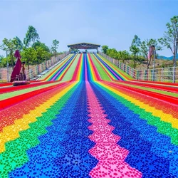 Outdoor rainbow dry snow slide for children and adult to have fun