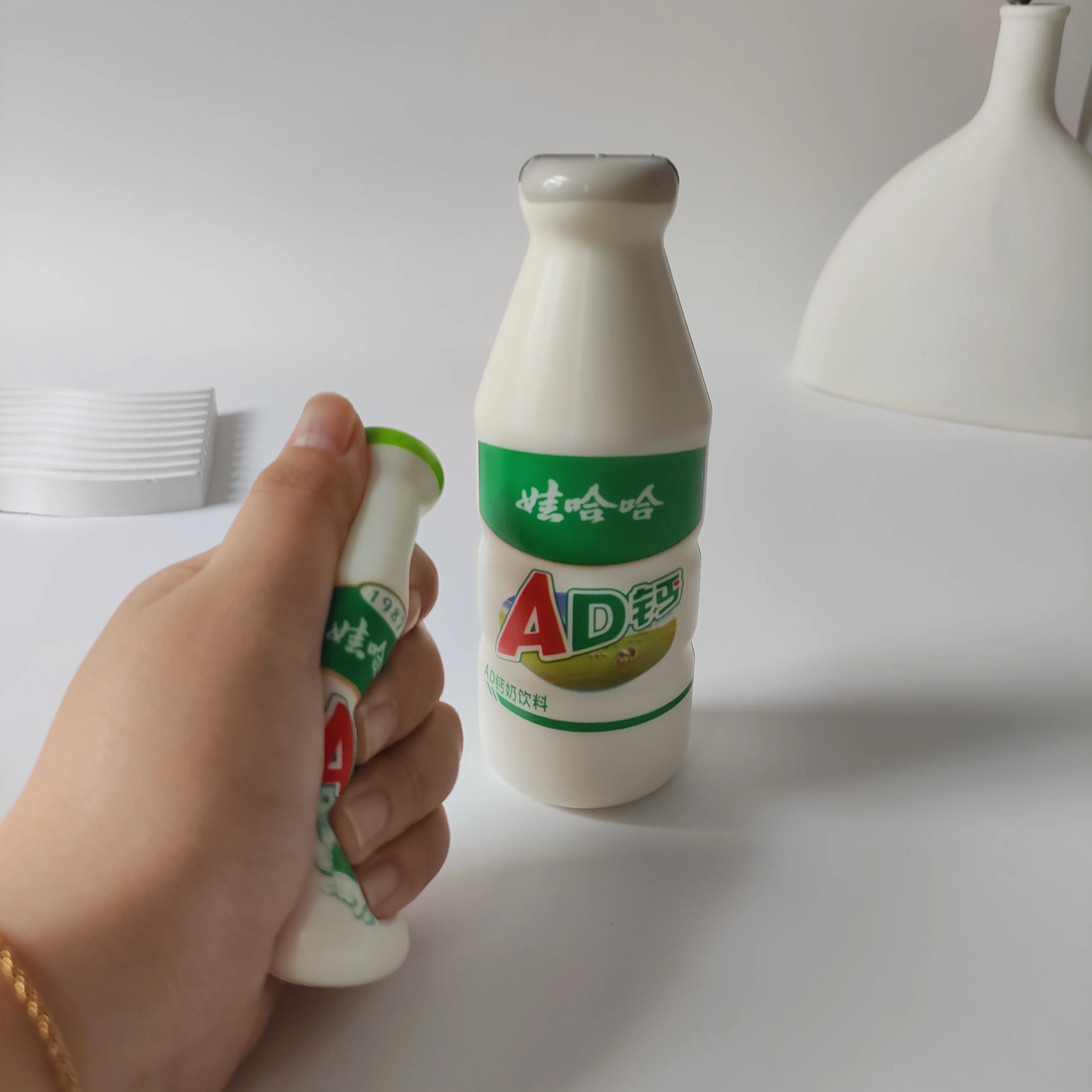 Wholesale simulation Wahaha Knead happy slow rebound bottle decompression toy AD calcium drink vent size number