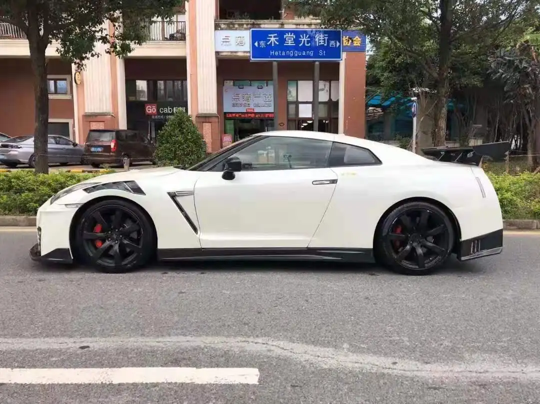 Nismo style half carbon fiber body kit for GTR R35 bumpers fenders side skirts wing