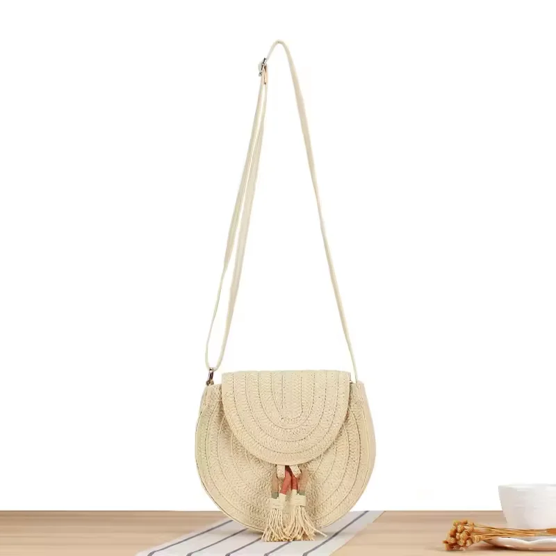 Wholesale Hot Selling Cute Beige Braided Paper Woven Handbag Vintage Women Round Shoulder straw beach bag with Tassels