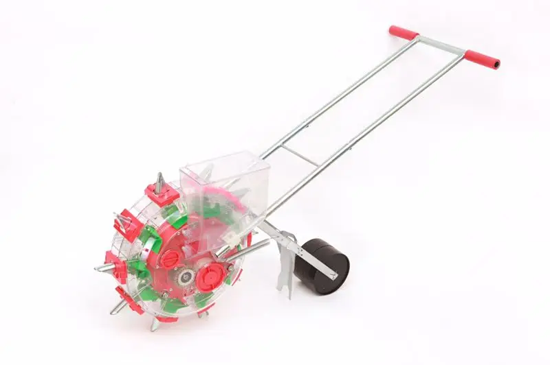 Hand-held small household planting corn, soybean and cotton seeder for farm planting