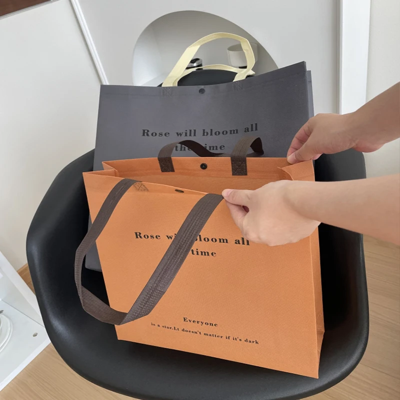 Eco Custom Logo Printed Reusable Extra-Wide Non Woven Fabric Tote Bag for Grocery Shopping for Packaging Gifts Secure Handle