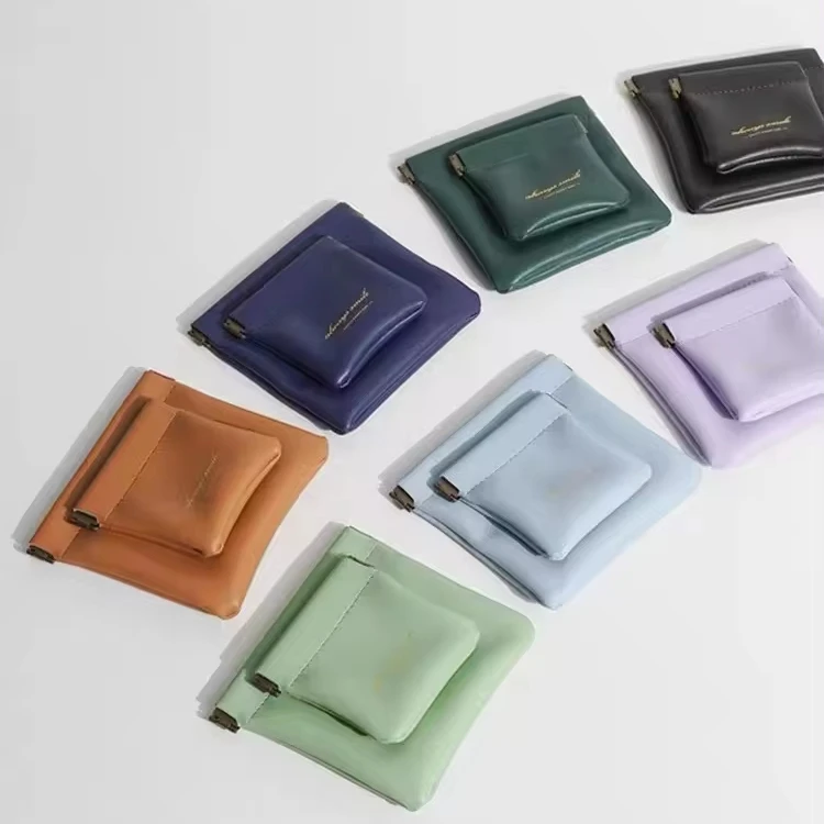 Custom logo PU Leather Magnetic Pouch eco leather jewelry pouch Jewelry PU Bag Squeeze Coin Bag With Embossed Logo
