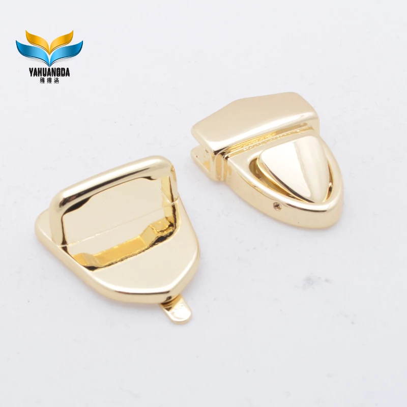 hot selling customized zinc alloy die casting plate lock light gold plating  push  lock  for handbags