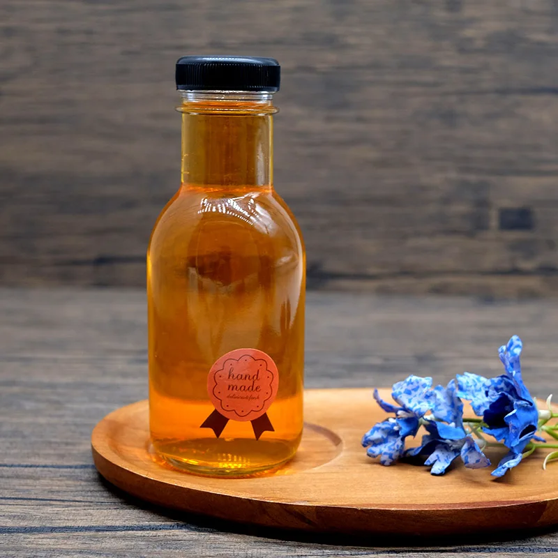 Factory price Food Grade Stout Glass Jar 250ml Glass  Hot Sauce liquid container for juice milk tea coffee