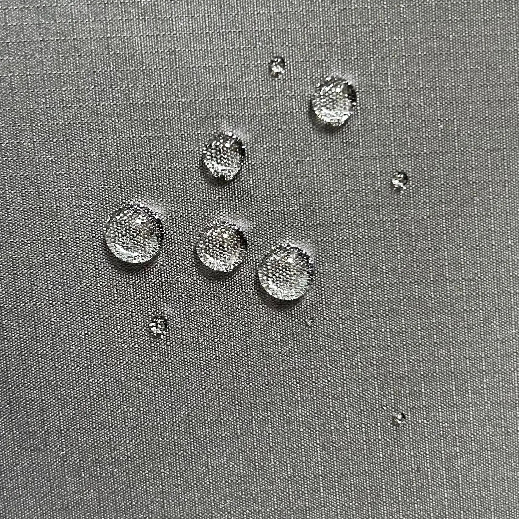 HOT SALE 100%Polyester 240 Plaid Ribstop Pongee fabric with 2 times PU coated used for outdoor Jackets&Garment