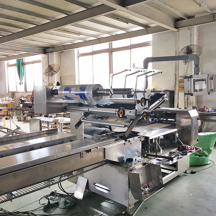 
Dxd-630 flow Wrapper Fully Automatic Chocolate Bar/biscuit/cake Flowing Packing, Machine Food Wrapping Machine Line 