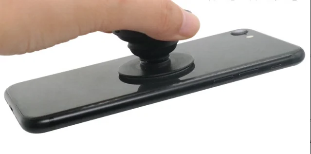 Manufacturers wholesale Mobile Phone push-pull retractable folding bracket paste portable air cushion bracket pattern LOGO