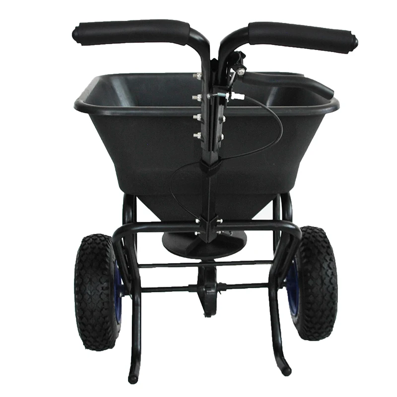 Hand seeding gritter with plastic bucket for seed and fertilizer