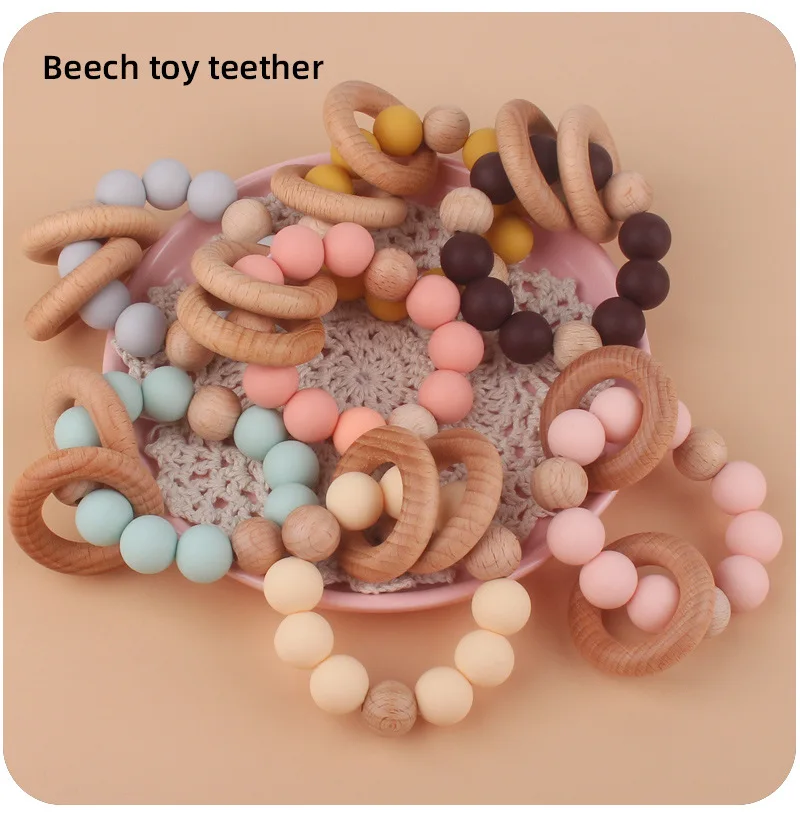 Hot Sell Newborn Silicone Beads Diy Baby Silicone Rattle Wrist Ball Teether Ring Beech Wooden Teething Ring Toys Bebe Gift