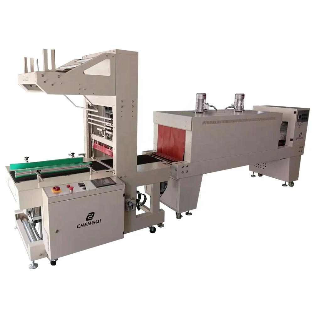 Carton box shrink wrapping machine
